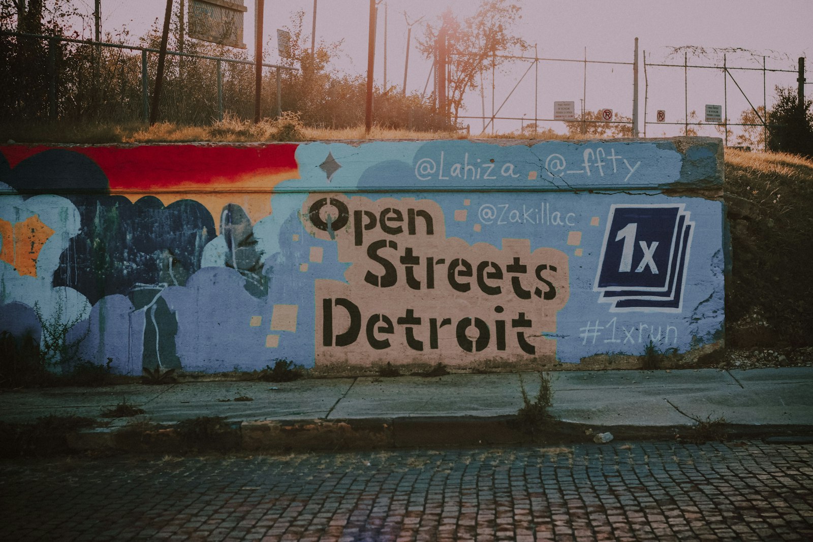 Open Streets Detroit mural on a brick wall