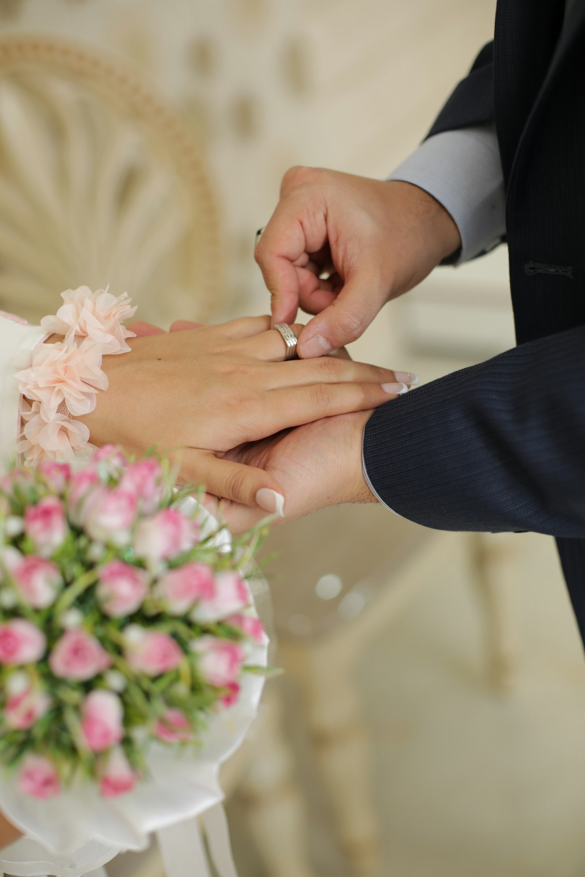 Couple exchanging rings